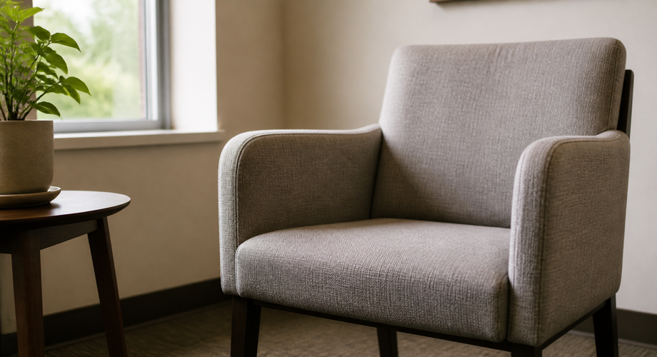 An empty waiting-room chair