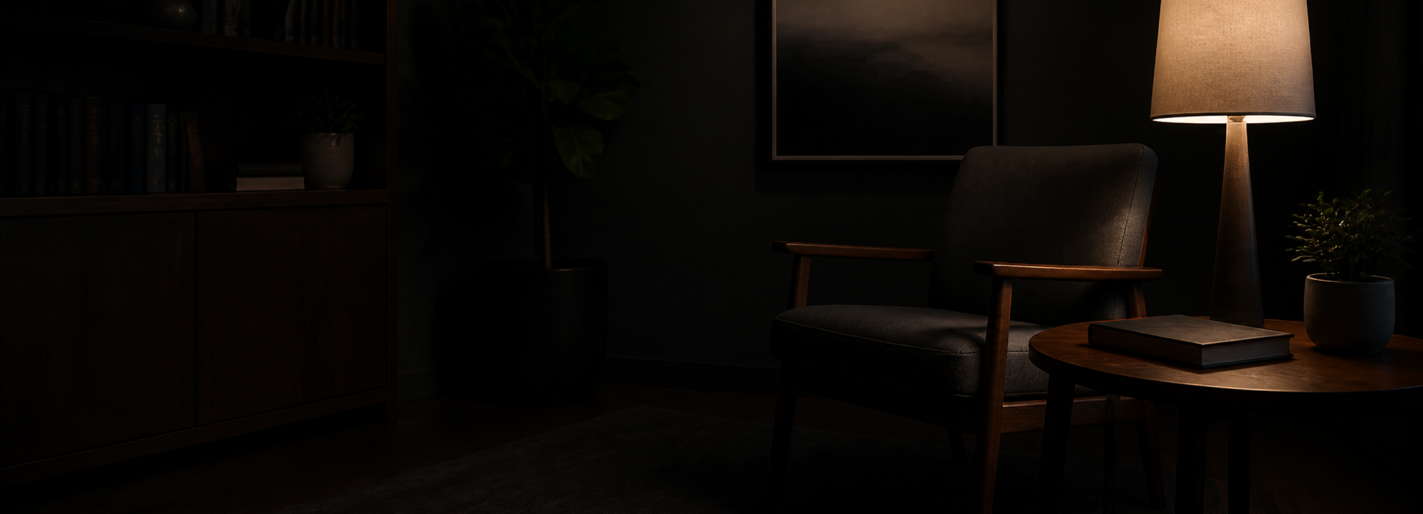 A desk lamp glowing at night
